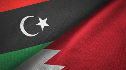 Libya and Bahrain two flags textile cloth, fabric texture 