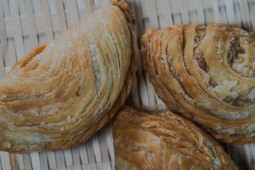 Curry puff or locally known as “Karipap” is a Malaysian traditional food. This tasty food have flaky pastry on the outside and delicious curry potato on the inside