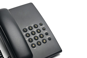 Classic wired telephone on a white background