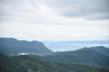 Aerial view of the morning foggy landscape in the mountains. The morning view on the hilltop.