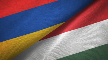 Armenia and Hungary two flags textile cloth, fabric texture