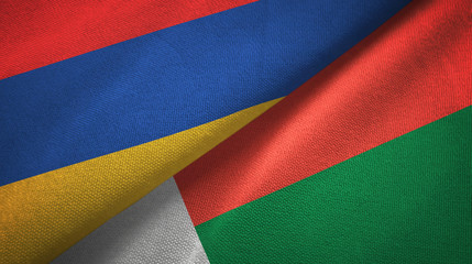 Armenia and Madagascar two flags textile cloth, fabric texture