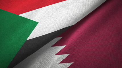 Fototapeta na wymiar Sudan and Qatar two flags textile cloth, fabric texture