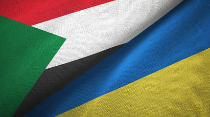 Sudan and Ukraine two flags textile cloth, fabric texture
