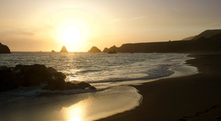 Magnificent sunset. Goat Rock Beach is located between Goat Rock Point and the Russian River along the Sonoma County shore near the town of Jenner. The Russian River, with its mouth at the north end 