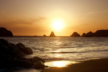 Magnificent sunset. Goat Rock Beach is located between Goat Rock Point and the Russian River along the Sonoma County shore near the town of Jenner. The Russian River, with its mouth at the north end 