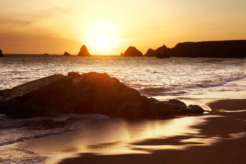 Magnificent sunset. Goat Rock Beach is located between Goat Rock Point and the Russian River along the Sonoma County shore near the town of Jenner. The Russian River, with its mouth at the north end 