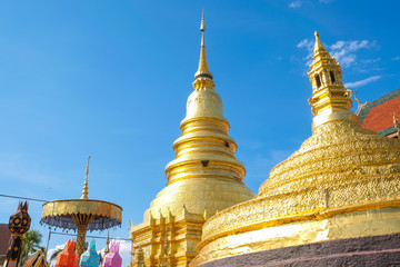 Wat Phra That Hariphunchai an iconic Buddhist pagoda in Lamphun province, Thailand. Its Lanna style...