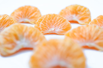 Isolated orange, Collection of whole orange or clementine fruits and peeled segments