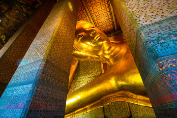 Golden big reclining buddha statue in Wat Pho, Bangkok