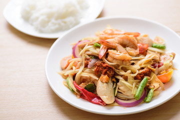 Spicy papaya salad with prawn and rice noodles, Thai food