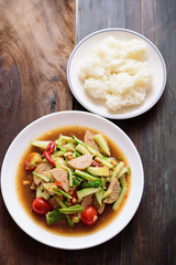 Spicy cucumber salad with steamed pork sausage and sticky rice, Thai food
