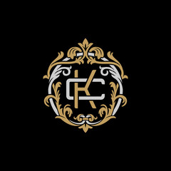 Initial letter C and K, CK, KC, decorative ornament emblem badge, overlapping monogram logo, elegant luxury silver gold color on black background