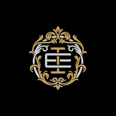 Obraz premium Initial letter E and I, EI, IE, decorative ornament emblem badge, overlapping monogram logo, elegant luxury silver gold color on black background