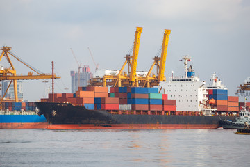 port Industrial loading containers shipping at Chao Phraya river side in bangkok.