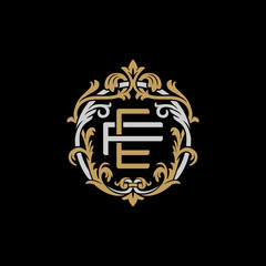 Initial letter F and E, FE, EF, decorative ornament emblem badge, overlapping monogram logo, elegant luxury silver gold color on black background