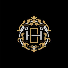 Initial letter H and D, HD, DH, decorative ornament emblem badge, overlapping monogram logo, elegant luxury silver gold color on black background