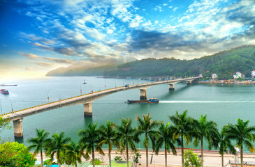 Obraz premium Van Don bridge connects Cam Pha City to Van Don peninsula in Quang Ninh, Vietnam