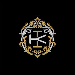 Initial letter K and I, KI, IK, decorative ornament emblem badge, overlapping monogram logo, elegant luxury silver gold color on black background