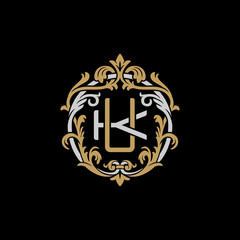 Initial letter K and U, KU, UK, decorative ornament emblem badge, overlapping monogram logo, elegant luxury silver gold color on black background