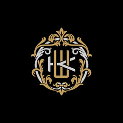 Initial letter K and W, KW, WK, decorative ornament emblem badge, overlapping monogram logo, elegant luxury silver gold color on black background