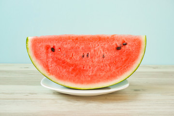 Watermelon on the table. Watermelon on a plate.  テーブルの上のスイカ。皿の上のスイカ