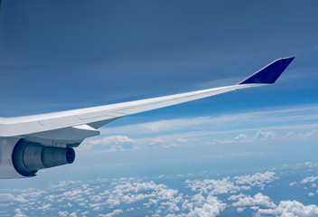 high definition skyline with cloud. Beautiful sunshine sky above clouds. Cabin view from airplane . Sunny above clouds from airplane window.
