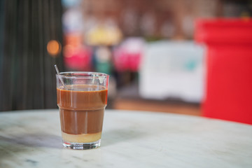 coffee with milk in a glass cup