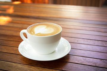 Coffee Cup with Beautiful Latte Art in Coffee Shop