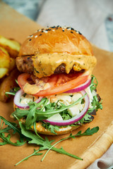 Cheese Burger. With french fries lettuce, tomatoes