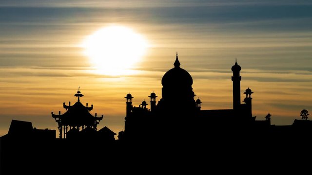Omar Ali Saifuddin Mosque with the Ceremonial Barge in Silhouette at Sunset, in Bandar Seri Begawan, the capital of Brunei