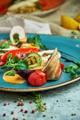 chicken roll stuffed with spices with grilled vegetables 