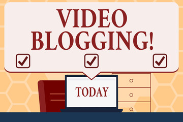 Text sign showing Video Blogging. Business photo text form of blog for which the medium is video Web television Blank Huge Speech Bubble Pointing to White Laptop Screen in Workspace Idea