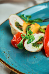 chicken roll stuffed with spices with grilled vegetables 