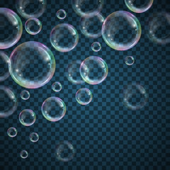 Realistic floating soap bubbles with rainbow reflection on transparent background. Design element for advertising booklet, flyer or poster
