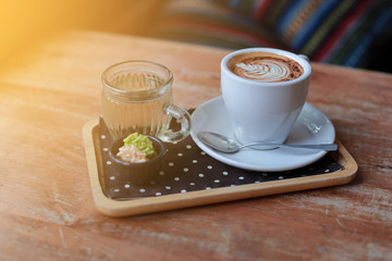 Hot coffee with foam milk, a cup of coffee