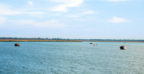 old big mooring buoys in the bay near danube delta