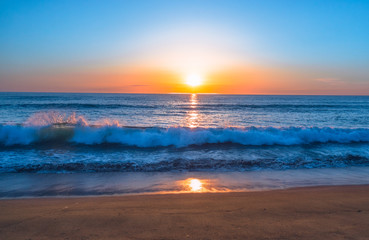 Beautiful Sunset on the Beach in Blue, Pink, and Orange Colors