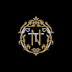 Initial letter T and N, TN, NT, decorative ornament emblem badge, overlapping monogram logo, elegant luxury silver gold color on black background