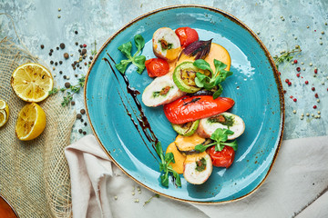 chicken roll stuffed with spices with grilled vegetables 