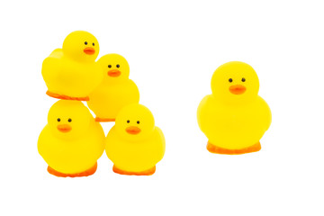 Yellow rubber duck on white background. Selective focus and copy space concept