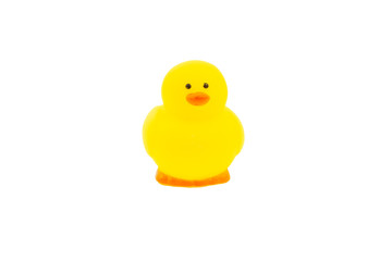 Yellow rubber duck on white background. Selective focus and copy space concept