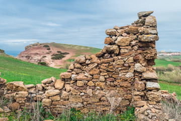 Ruins of the house on the ocean coast