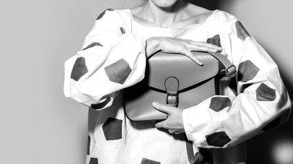 Fashion woman with handbag, black and white