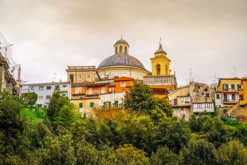 Ariccia - rome suburb in Lazio on Castelli Romani the cupola dome of Santa Maria Church with village skyline