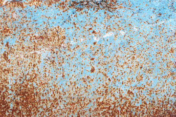 Rusty and painted textured metal background