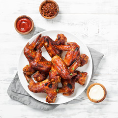 Fried Chicken Wings with sauces.