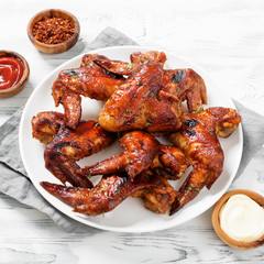 Fried Chicken Wings with sauces.