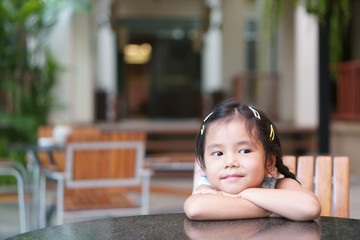 Asian child smiling or kid girl student vacant or thinking for new idea and happy fun or cheerful...