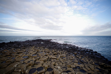 Basalt column rock coastline 